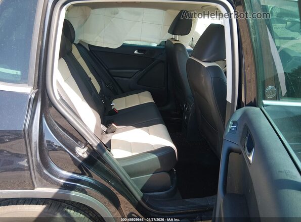 WVGSV7AX7HK015296 2017 VOLKSWAGEN TIGUAN Black Widok naklejki z numerem VIN