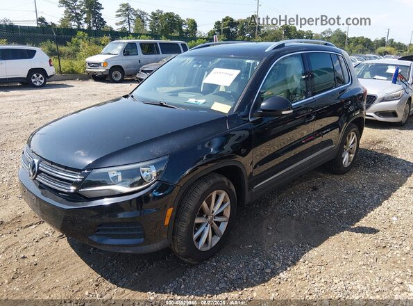 WVGSV7AX7HK015296 2017 VOLKSWAGEN TIGUAN Black Przód lewy