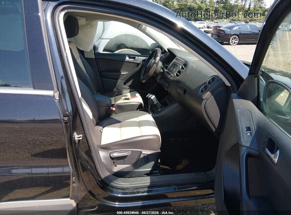 WVGSV7AX7HK015296 2017 VOLKSWAGEN TIGUAN Black Widok wnętrza z przodu