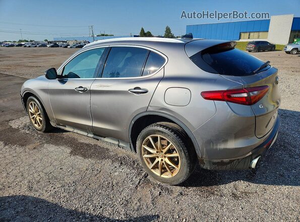 ZASFAKBNXJ7B71902 2018 ALFA ROMEO STELVIO Silver Trasero izquierdo