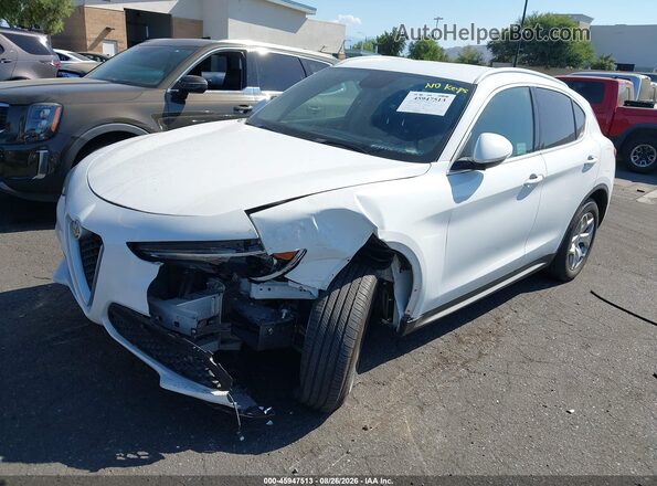ZASPAJANXK7C49385 2019 ALFA ROMEO STELVIO White Առջևի ձախ երեք քառորդ տեսարան