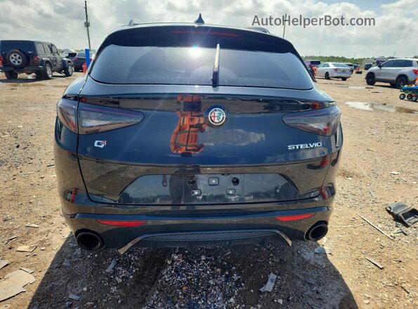 ZASPAKBN1R7D78887 2024 ALFA ROMEO STELVIO Black Rear view