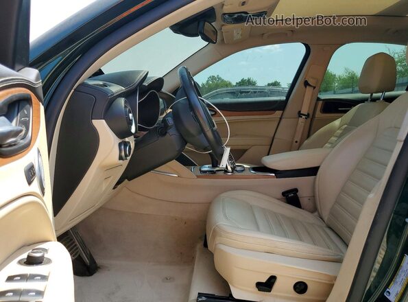 ZASPAKBN5M7D19771 2021 ALFA ROMEO STELVIO Зеленый Вид салона спереди