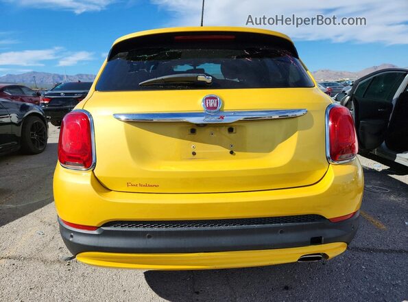 ZFBCFXBT2GP352223 2016 FIAT 500X Yellow Հետևի տեսք