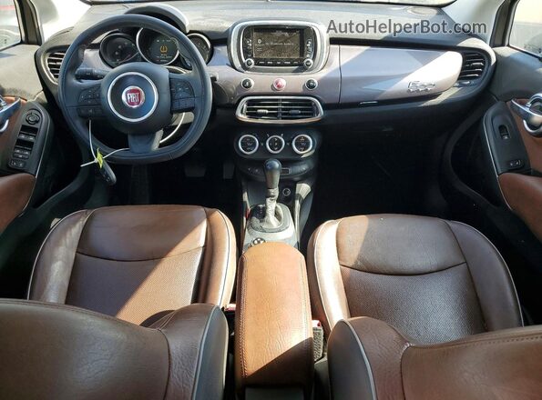 ZFBCFXDB0HP518826 2017 FIAT 500X Brown Vista del salpicadero