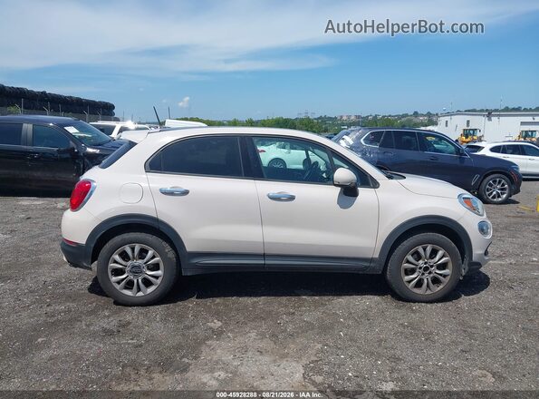 ZFBCFYBTXGP514198 2016 FIAT 500X Cream Vista interior trasera