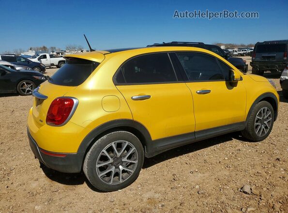 ZFBCFYET0GP334591 2016 FIAT 500X Yellow Trasero derecho