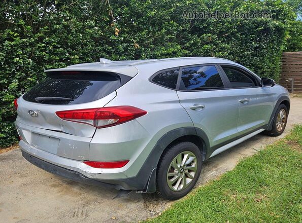 KM8J33A43JU654740 2018 HYUNDAI TUCSON Серебряный Вид спереди