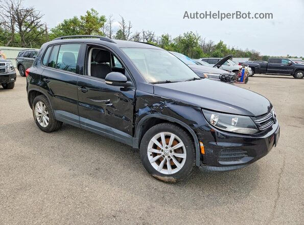 WVGBV7AX0HK049354 2017 VOLKSWAGEN TIGUAN Black Front view