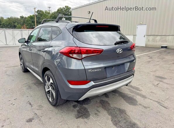 KM8J3CA24HU554624 2017 HYUNDAI TUCSON Black Rear right