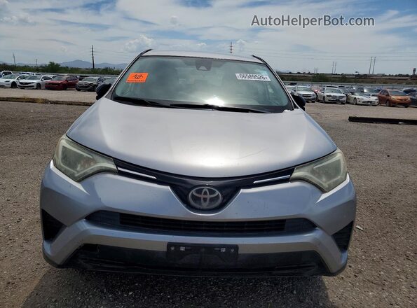 JTMZFREV3JD128256 2018 TOYOTA RAV4 Silver Widok z tyłu