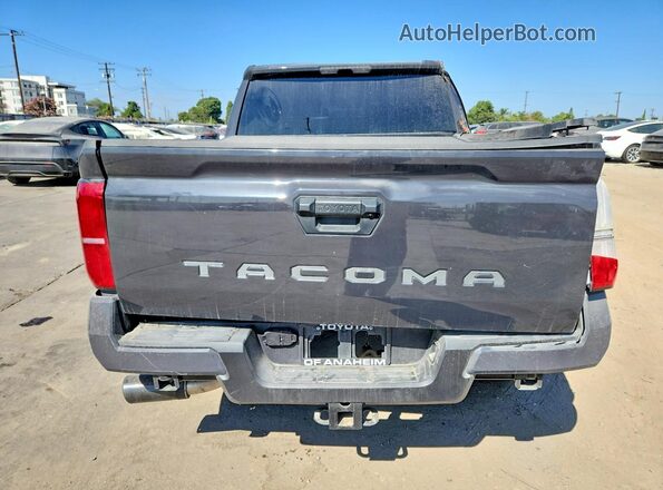 3TMKB5FN8TM054571 2026 TOYOTA TACOMA Gray Front interior view