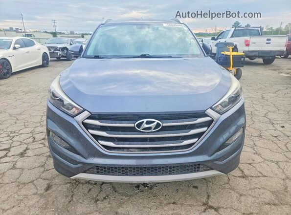 KM8J3CA22HU265032 2017 HYUNDAI TUCSON Gray უკანა ხედი
