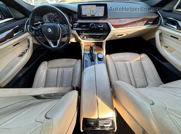 WBAJB1C50JB083749 2018 BMW 5 SERIES Charcoal Vista de los asientos traseros