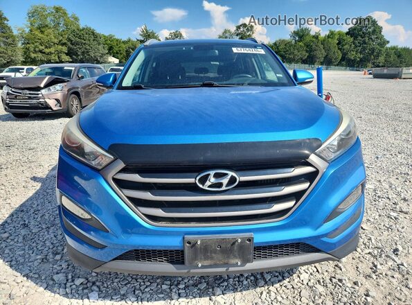 KM8J3CA22GU184515 2016 HYUNDAI TUCSON Blue Rear view