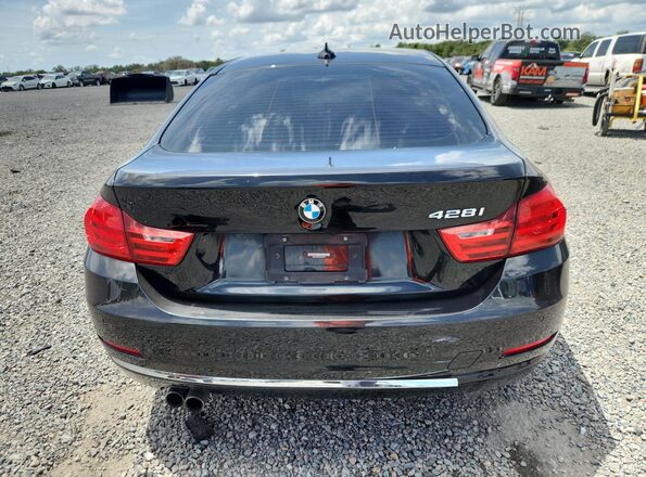 WBA4A9C5XGG506136 2016 BMW 4 SERIES Black Widok wnętrza z przodu