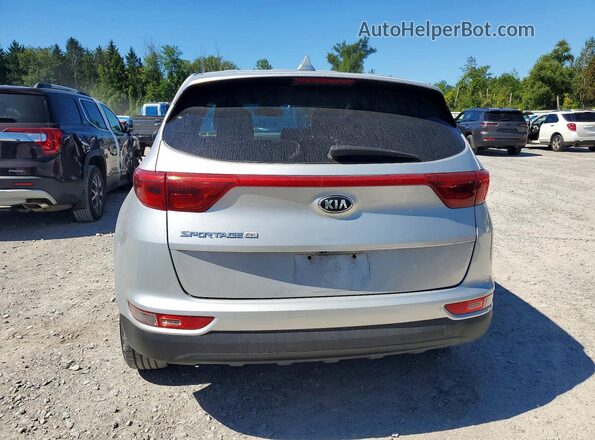 KNDPM3AC0K7581121 2019 KIA SPORTAGE Silver Вид салону спереду