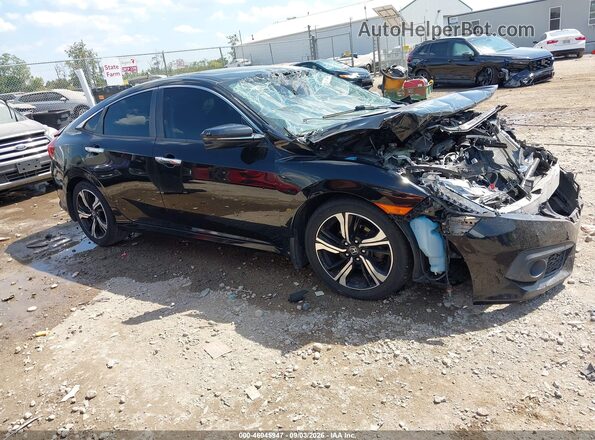 19XFC1F9XGE020318 2016 HONDA CIVIC Black Widok wnętrza z tyłu