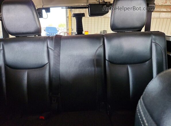 1C4HJWFG9GL215313 2016 JEEP WRANGLER Black Rear seats view