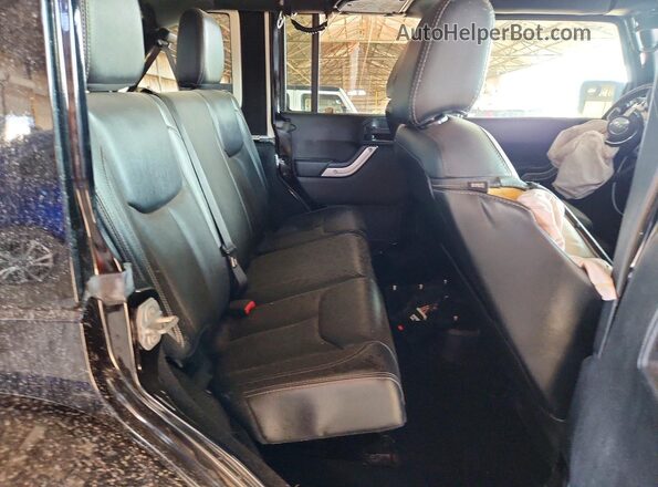 1C4HJWFG9GL215313 2016 JEEP WRANGLER Black Rear interior view