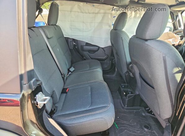 1C4PJXDN3RW111694 2024 JEEP WRANGLER Black Widok wnętrza z tyłu