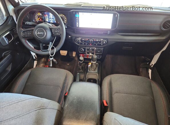 1C4PJXFG4RW217800 2024 JEEP WRANGLER Белый Вид панели приборов