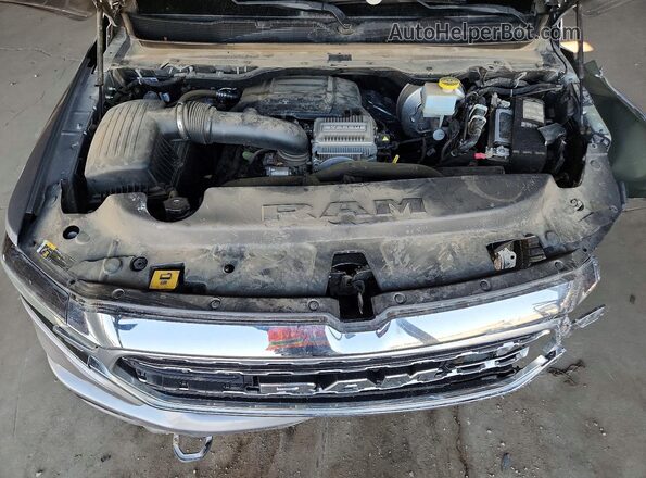 1C6SRFHT9PN581163 2023 RAM 1500 Серый Вид задней части салона