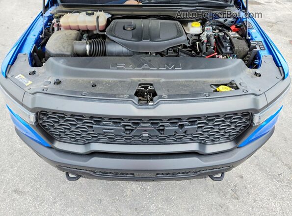 1C6SRFLP9SN620658 2025 RAM 1500 Blue Rear interior view