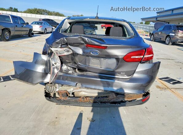 1FADP3F27GL280635 2016 FORD FOCUS Gray Rear view