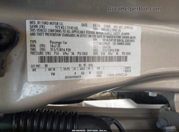 1FADP3F28GL320303 2016 FORD FOCUS Champagne Vista del compartimento del motor