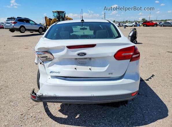 1FADP3F29HL207011 2017 FORD FOCUS White Rear view