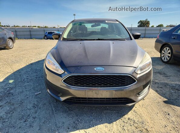 1FADP3F2XJL261097 2018 FORD FOCUS Серый Вид спереди