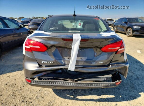 1FADP3F2XJL261097 2018 FORD FOCUS Серый Вид сзади
