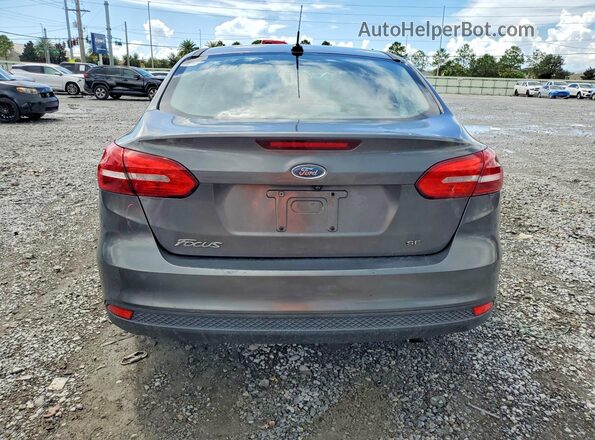 1FADP3F2XJL329608 2018 FORD FOCUS Gray Rear view