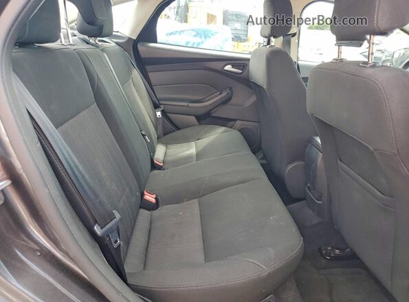 1FADP3F2XJL329608 2018 FORD FOCUS Gray Rear seats view