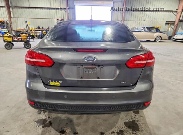 1FADP3H28JL220707 2018 FORD FOCUS Silver Вид ззаду