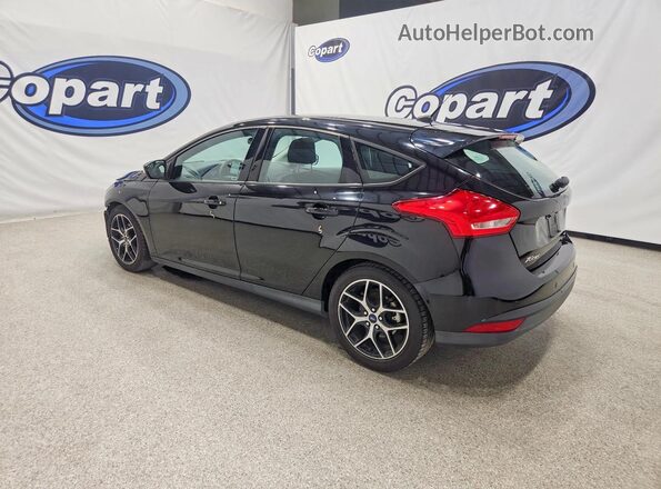 1FADP3M25JL230553 2018 FORD FOCUS Black Rear left