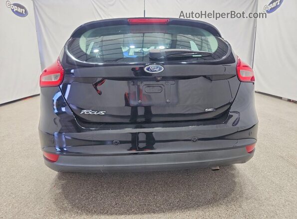 1FADP3M25JL230553 2018 FORD FOCUS Black Rear view