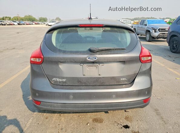 1FADP3M28JL236864 2018 FORD FOCUS Charcoal Rear view