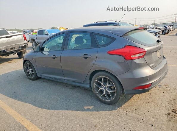 1FADP3M28JL236864 2018 FORD FOCUS Charcoal Rear left