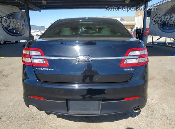 1FAHP2E80HG105431 2017 FORD TAURUS Черный Вид сзади