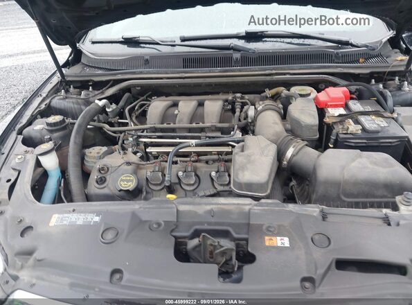 1FAHP2E86GG135693 2016 FORD TAURUS Black Rear view