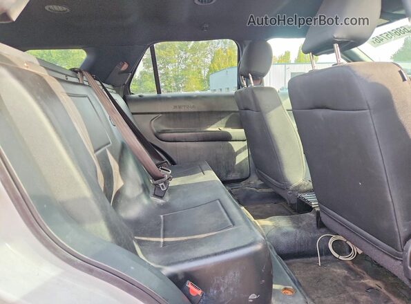 1FM5K8AR7HGD66855 2017 FORD EXPLORER White Vista de los asientos traseros
