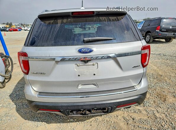 1FM5K8F82KGB43047 2019 FORD EXPLORER Серебряный Вид сзади