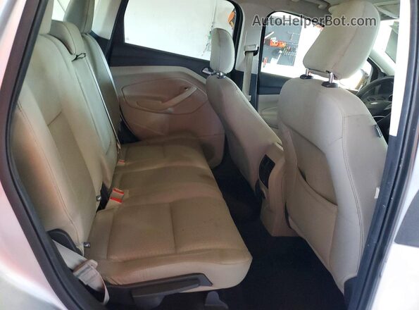 1FMCU0GD4JUB96475 2018 FORD ESCAPE Silver Widok wnętrza z tyłu