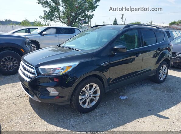1FMCU0GD4JUD34824 2018 FORD ESCAPE Black Vista tres cuartos delantera izquierda