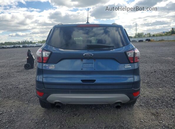 1FMCU0HD2JUC81636 2018 FORD ESCAPE Blue Vista trasera