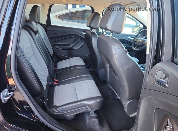 1FMCU0JDXHUE66313 2017 FORD ESCAPE Black Widok wnętrza z tyłu