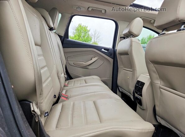 1FMCU9GD0HUA86778 2017 FORD ESCAPE Gray Vista interior trasera