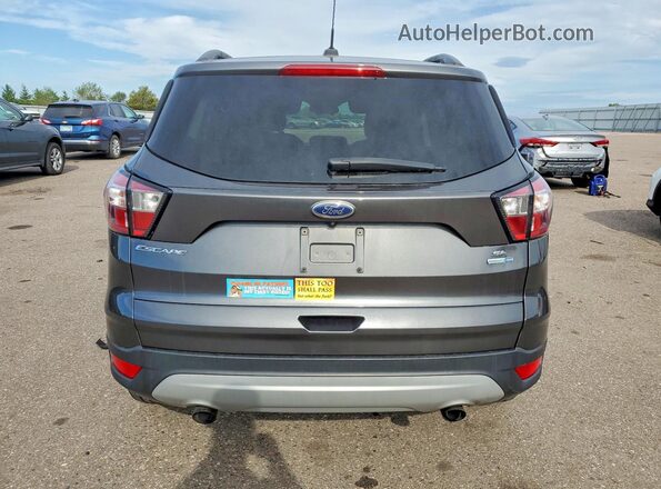 1FMCU9GD4JUD29496 2018 FORD ESCAPE Серый Вид сзади